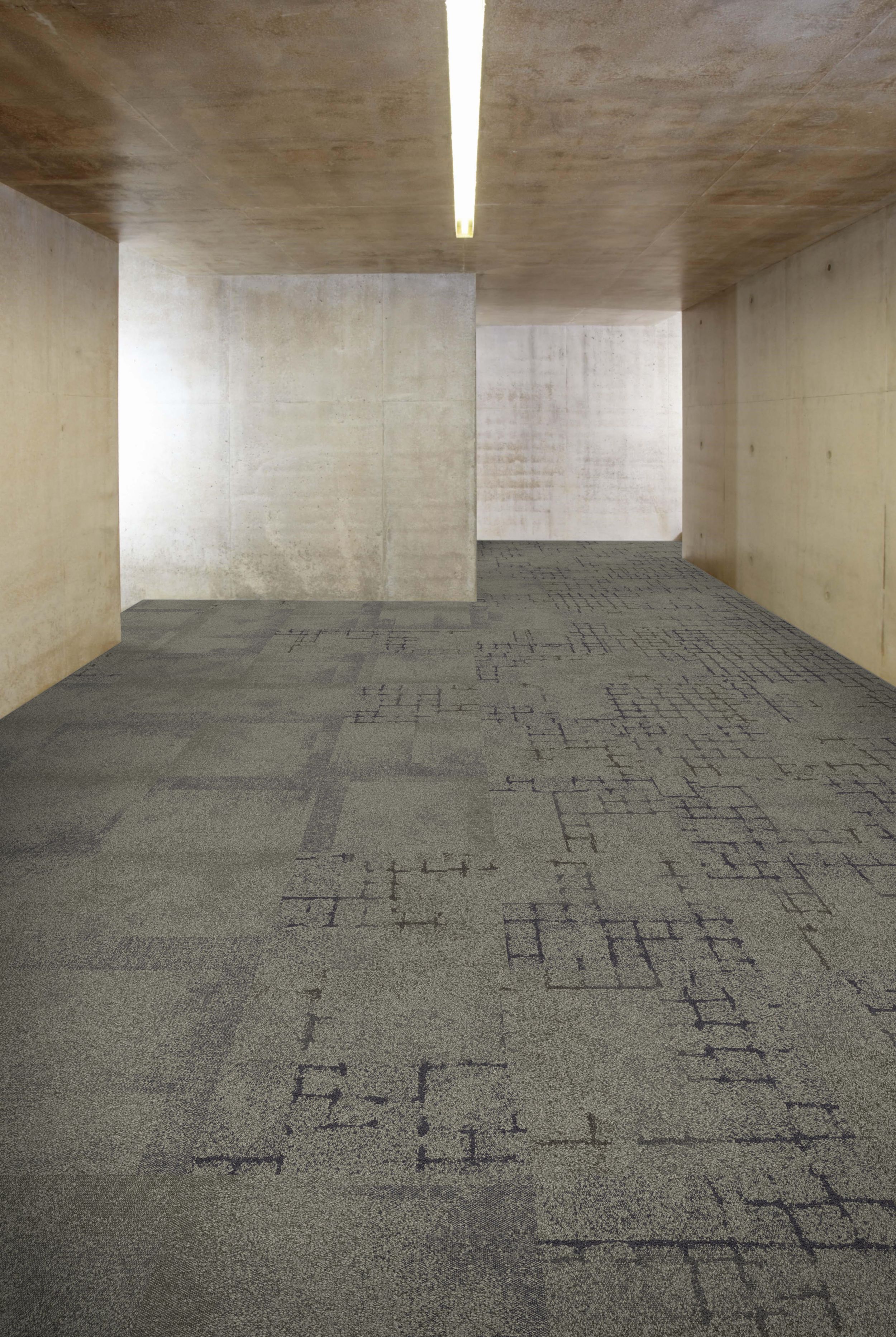 Interface Flagstone, Kerbstone and Sett in Stone carpet tile in corridor with concrete walls and ceiling image number 3